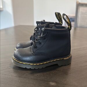 Dr. Martens Black Boots with Lace-Up Design and Sturdy Sole